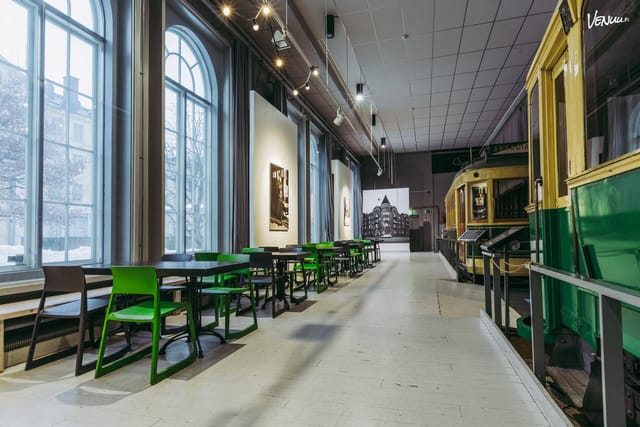 Spacious Tram Hall venue with vintage decor, ideal for meetings and events.