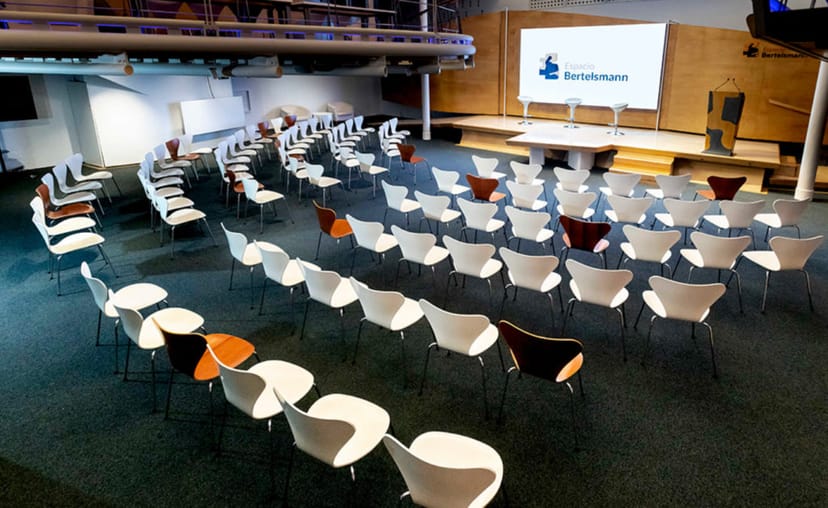 Whole venue at Espacio Bertelsmann, organized for a presentation event with audience seating.