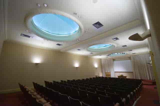 Wolfson Lecture Theatre, spacious conference room with skylights for seminars and events.