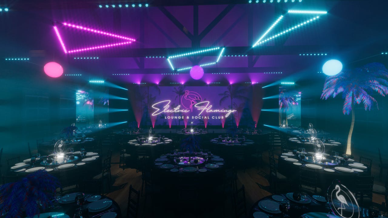 Vibrant Christmas party venue with elegant tables and dynamic lighting at The Brewery.