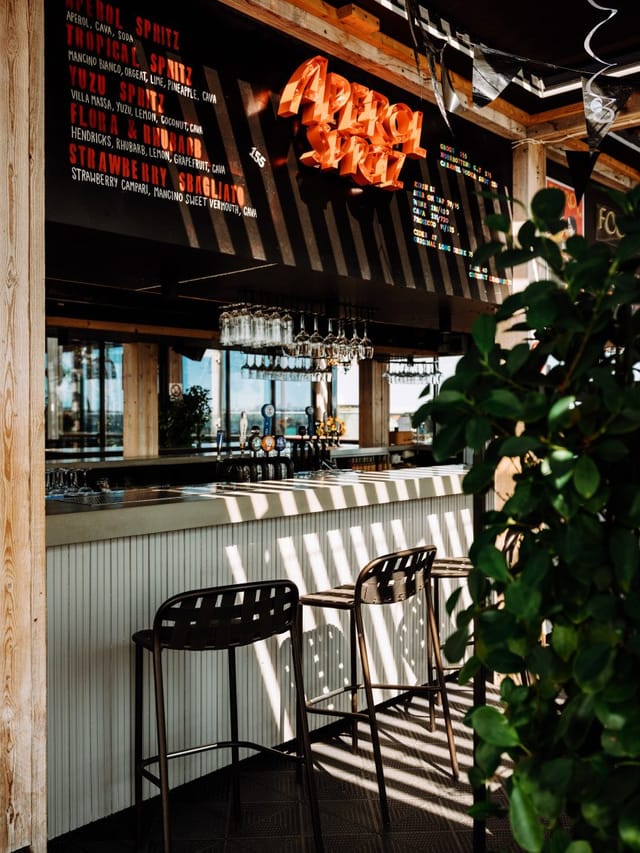 IMA Rooftop Terrace bar with modern design, ideal for networking events and receptions.