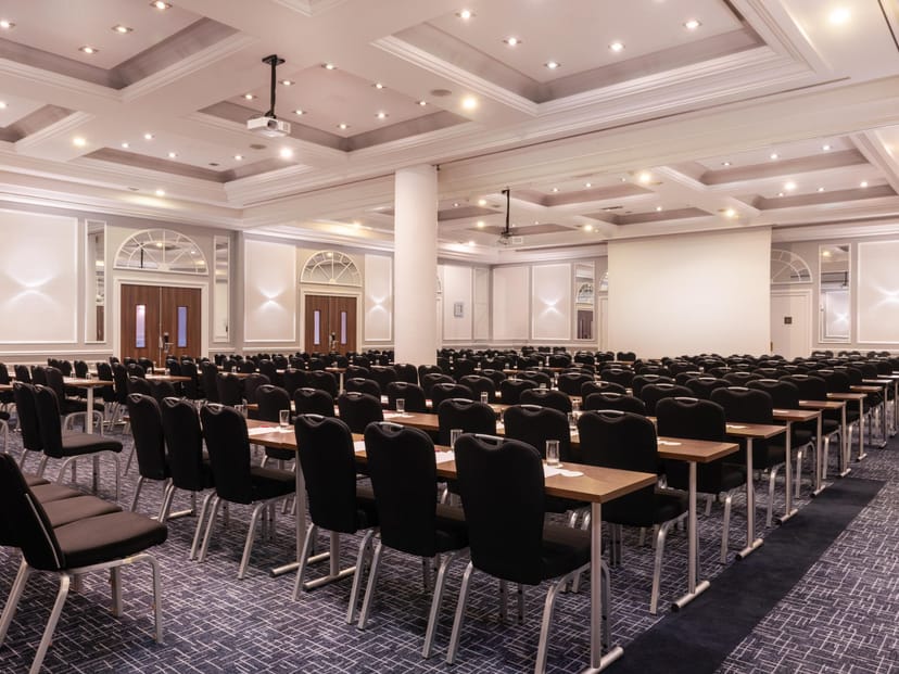 Spacious conference room at Crowne Plaza Paris for corporate events and seminars.