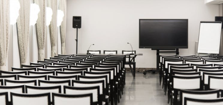 Fornasetti meeting space with sleek chairs, ideal for presentations and workshops.