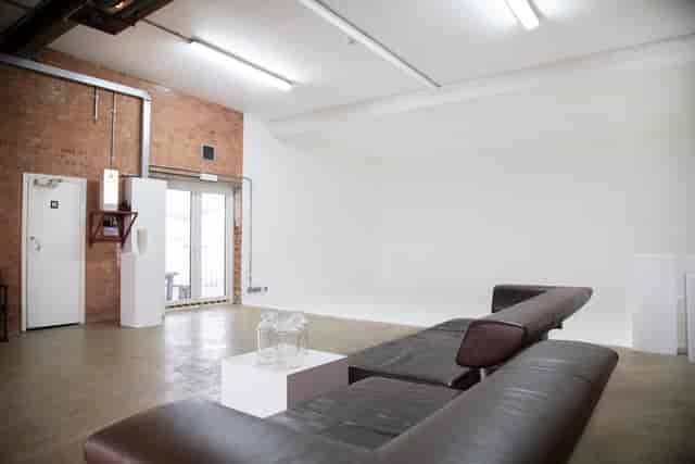 Versatile event space in Bow Bunker, East London with exposed brick and natural light.