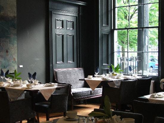 Elegant dining space at No.11 Hotel & Brasserie, ideal for business lunches and events.