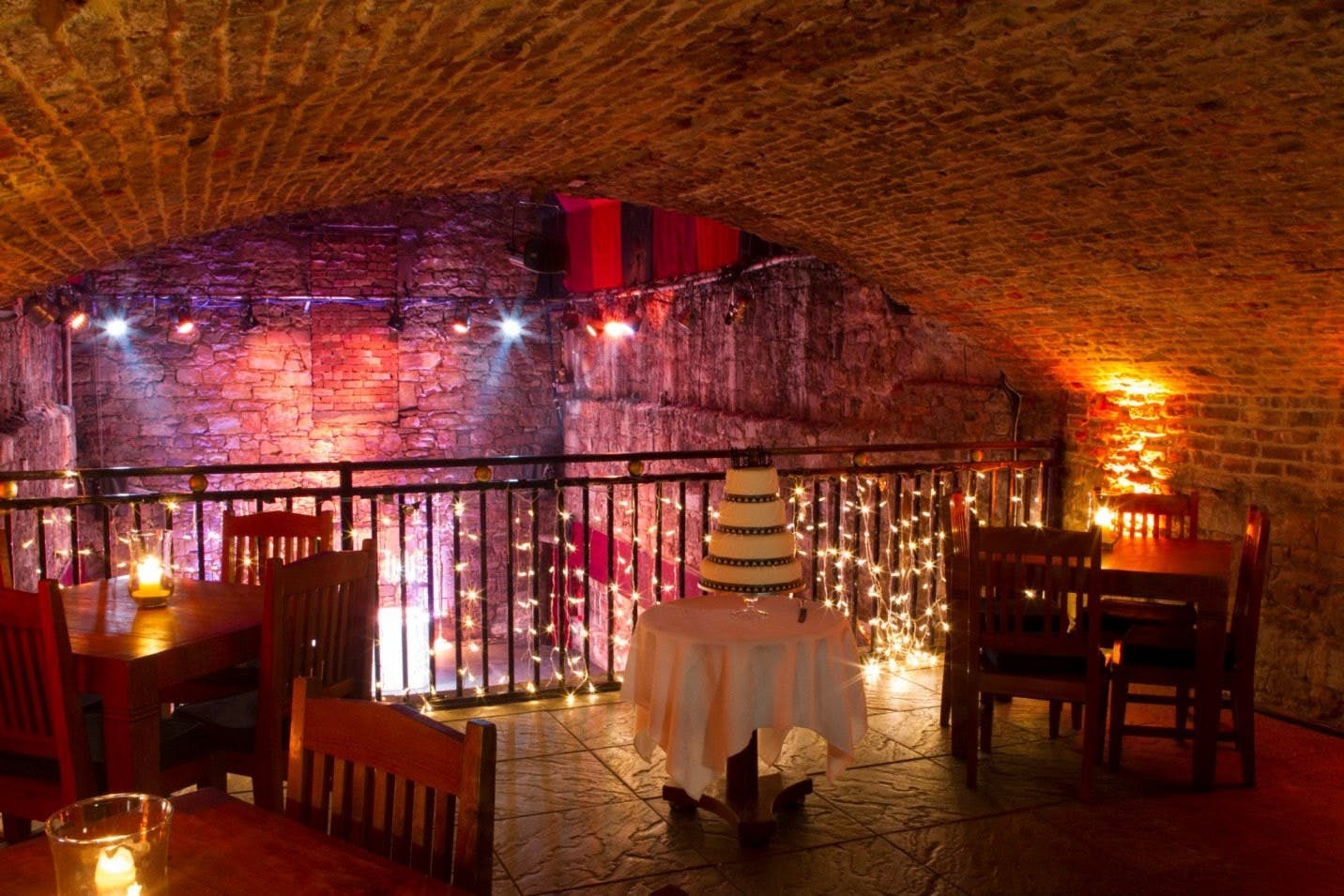 Charming underground venue with exposed brick, ideal for weddings and private parties.