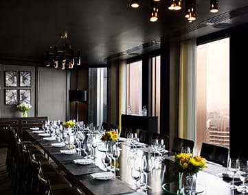 Private dining room in City Social London with elegant table setup for corporate events.