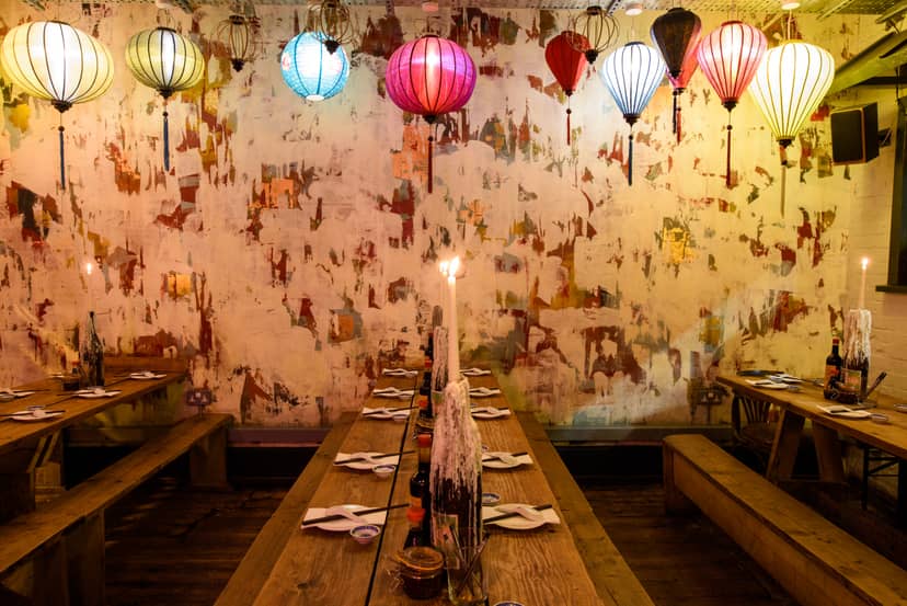 Hanging Garden Room with colorful lanterns, ideal for intimate gatherings and events.