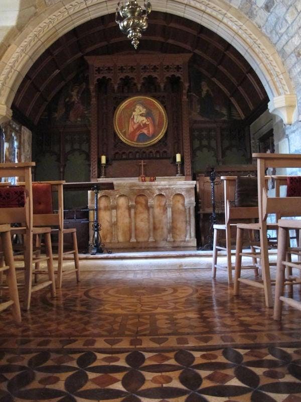 Chapel in Newbattle Abbey with warm wood tones, ideal for intimate retreats and ceremonies.