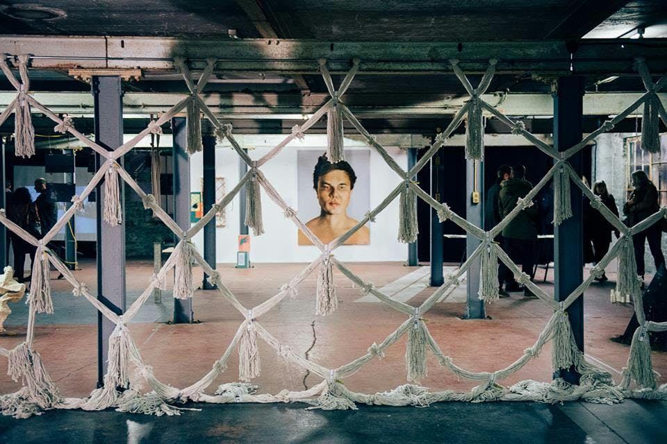 Artistic event space at The Biscuit Factory with textured installation for creative gatherings.