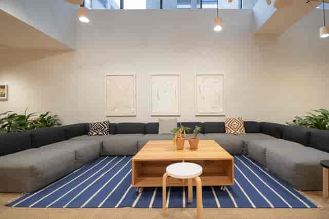 Modern lounge area in Shoreditch Exchange for informal meetings and networking events.