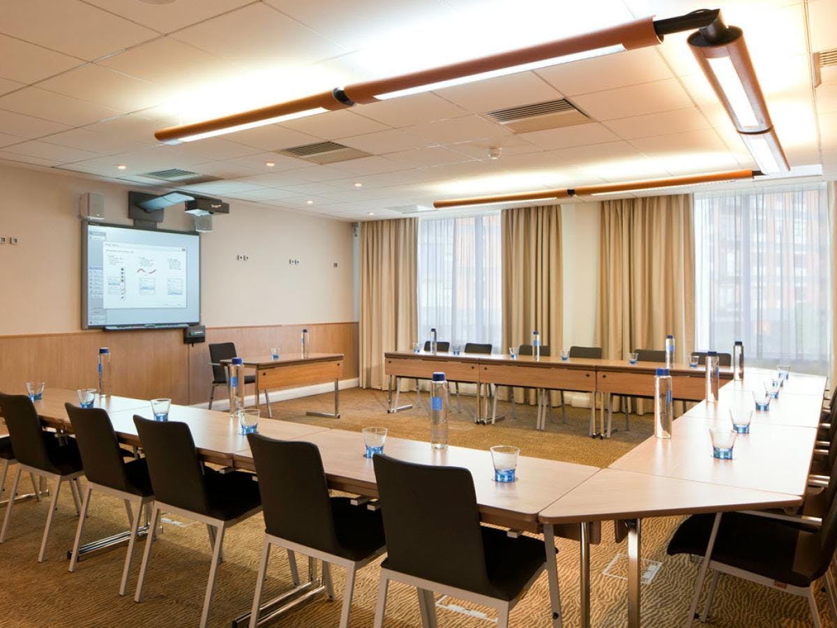 Canmore Hall meeting room with U-shaped table, ideal for conferences and workshops.