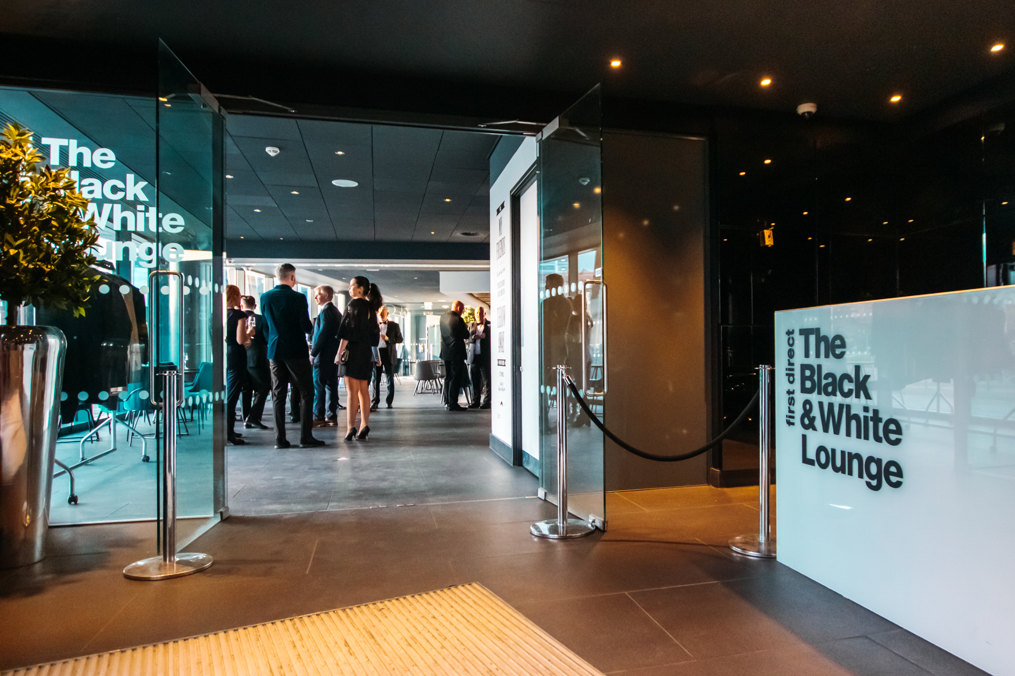 Black and White Lounge at First Direct Arena, elegant event space for networking and meetings. - Banner