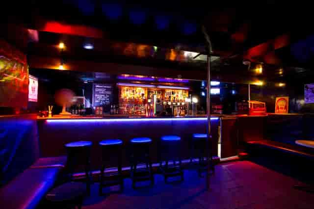 Stylish Bar 13 Edinburgh with vibrant lighting, ideal for networking events and gatherings.