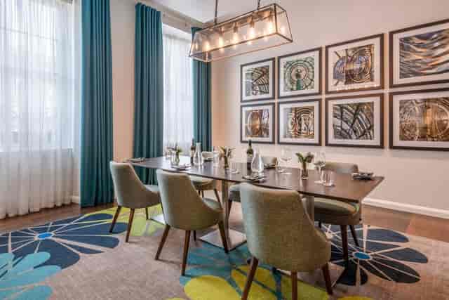 Private dining room with elegant tableware for intimate meetings and events.