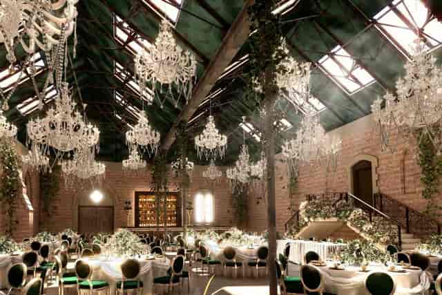 Elegant event space with chandeliers in Dalton Old Pump House for weddings and corporate events.