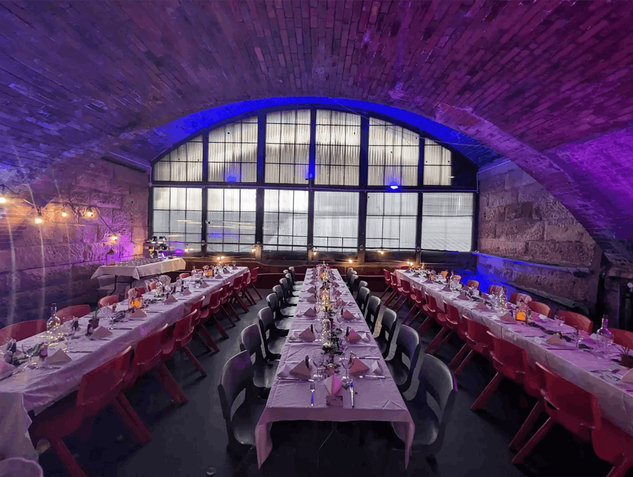 Elegant dining space at Leith Arches, ideal for events with arched ceiling and natural light.