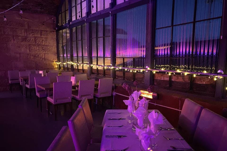 Elegant event space in Leith Arches with ambient lighting for upscale gatherings.