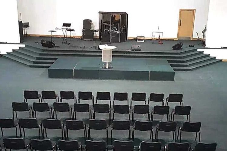 Multi-Purpose Hall at Vine Conference Centre with raised stage for conferences and workshops.