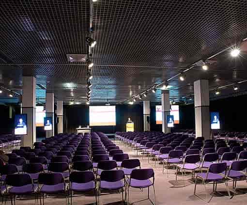 SEC Meeting Academy conference room with purple chairs, ideal for impactful presentations.