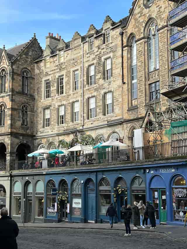 Outdoor terrace at Scotts Kitchen with historic architecture, perfect for events and gatherings.
