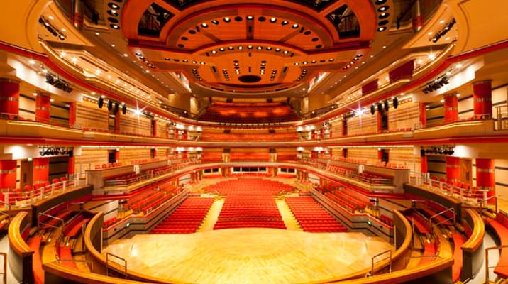 Symphony Hall auditorium with tiered seating, ideal for events and performances. - Banner