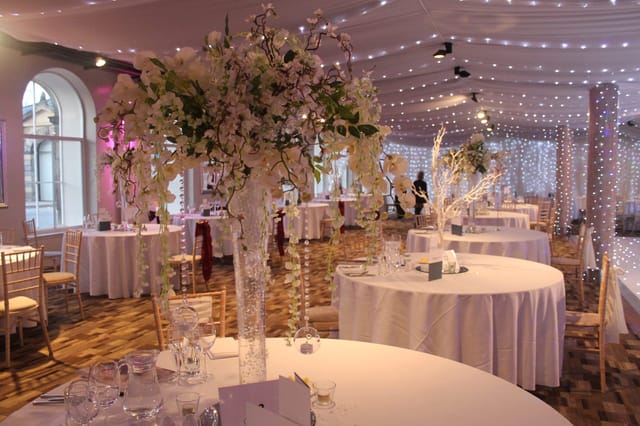Elegant event space at Eskmills Venue with floral centerpieces, perfect for weddings and corporate events.