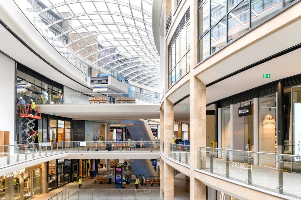 Modern serviced offices in a spacious atrium, ideal for events and exhibitions.