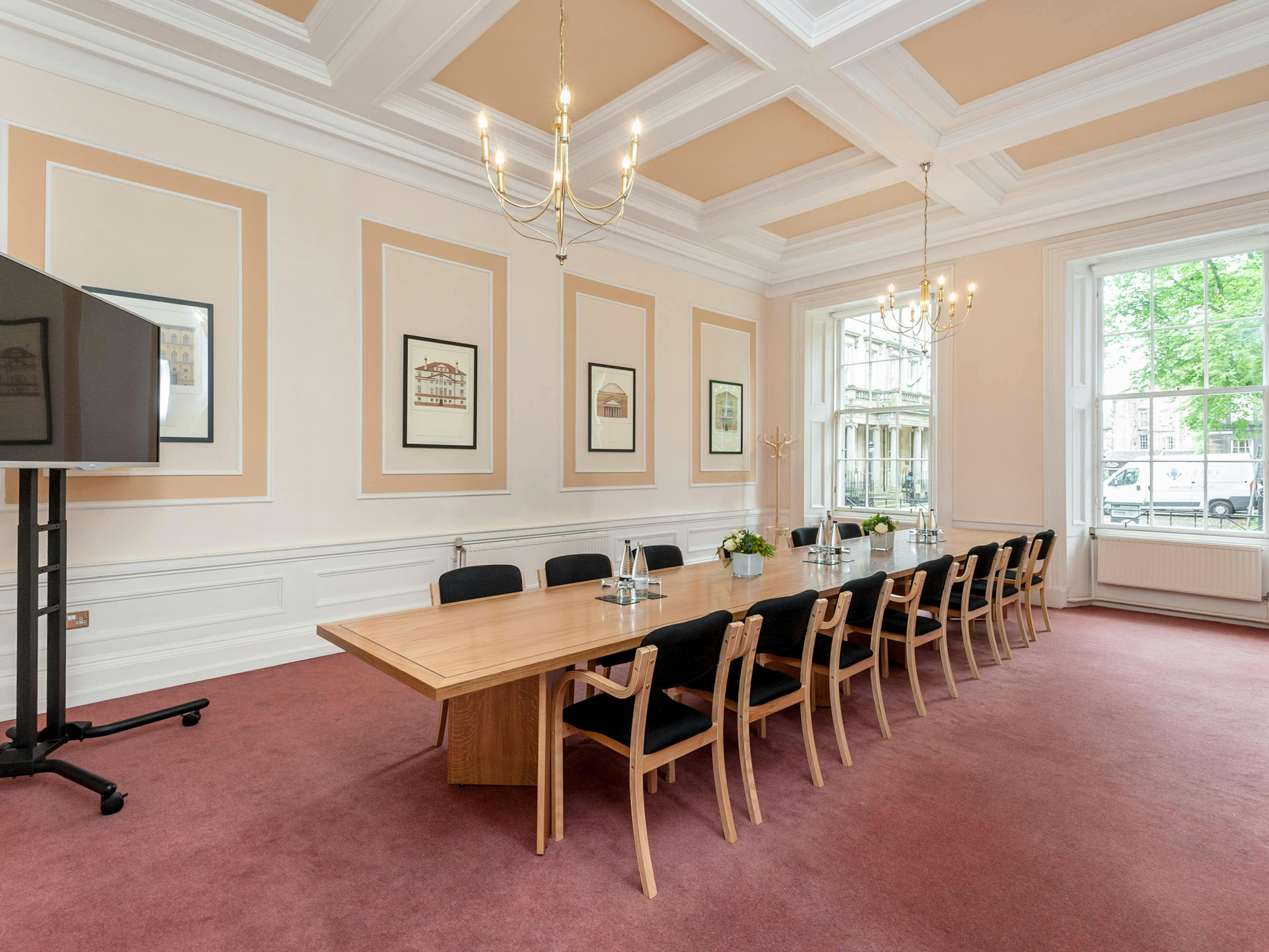 Three Boardrooms in Nexus Business Space with large wooden table for meetings and presentations.