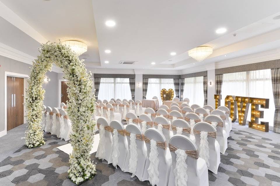 Elegant event space with floral arch for weddings at Mercure Manchester Norton Grange.