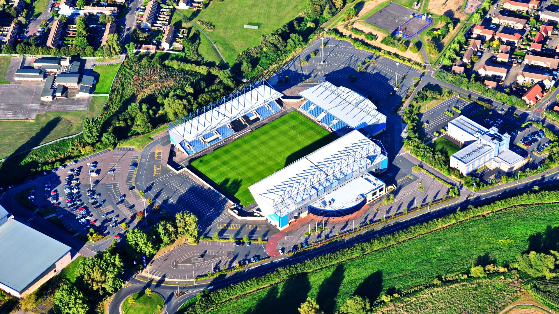 Modern Christchurch Suite at Kassam Stadium, ideal for events and corporate gatherings. - Banner
