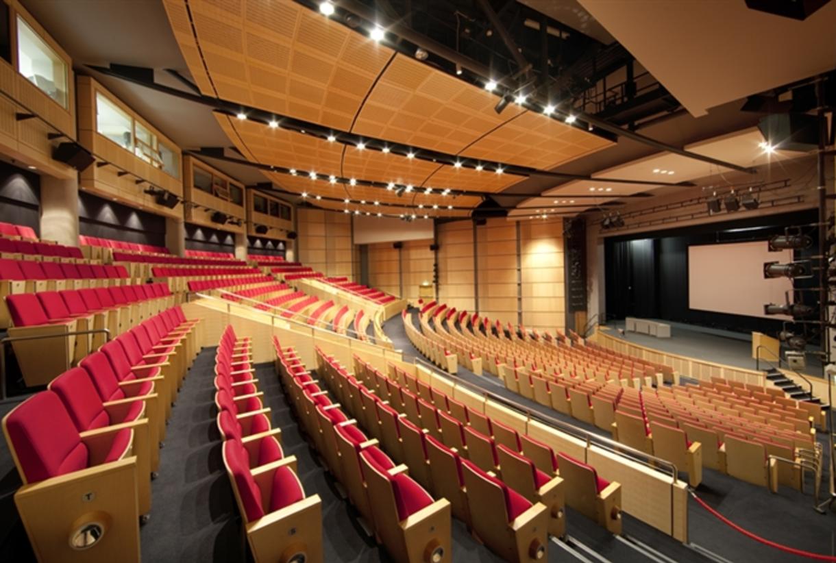 Central Hall Manchester auditorium with tiered seating for conferences and seminars. - Banner