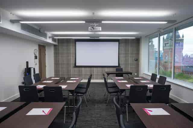 Modern meeting room in Etc.venues Manchester, ideal for workshops and presentations.
