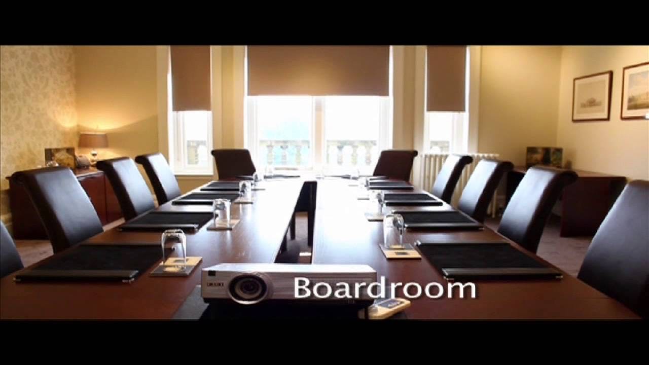 Boardroom in Tatton Park with long table, ideal for professional meetings and presentations.