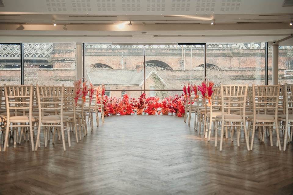 Elegant event space at Dukes92 with floral installation, perfect for weddings or corporate events.