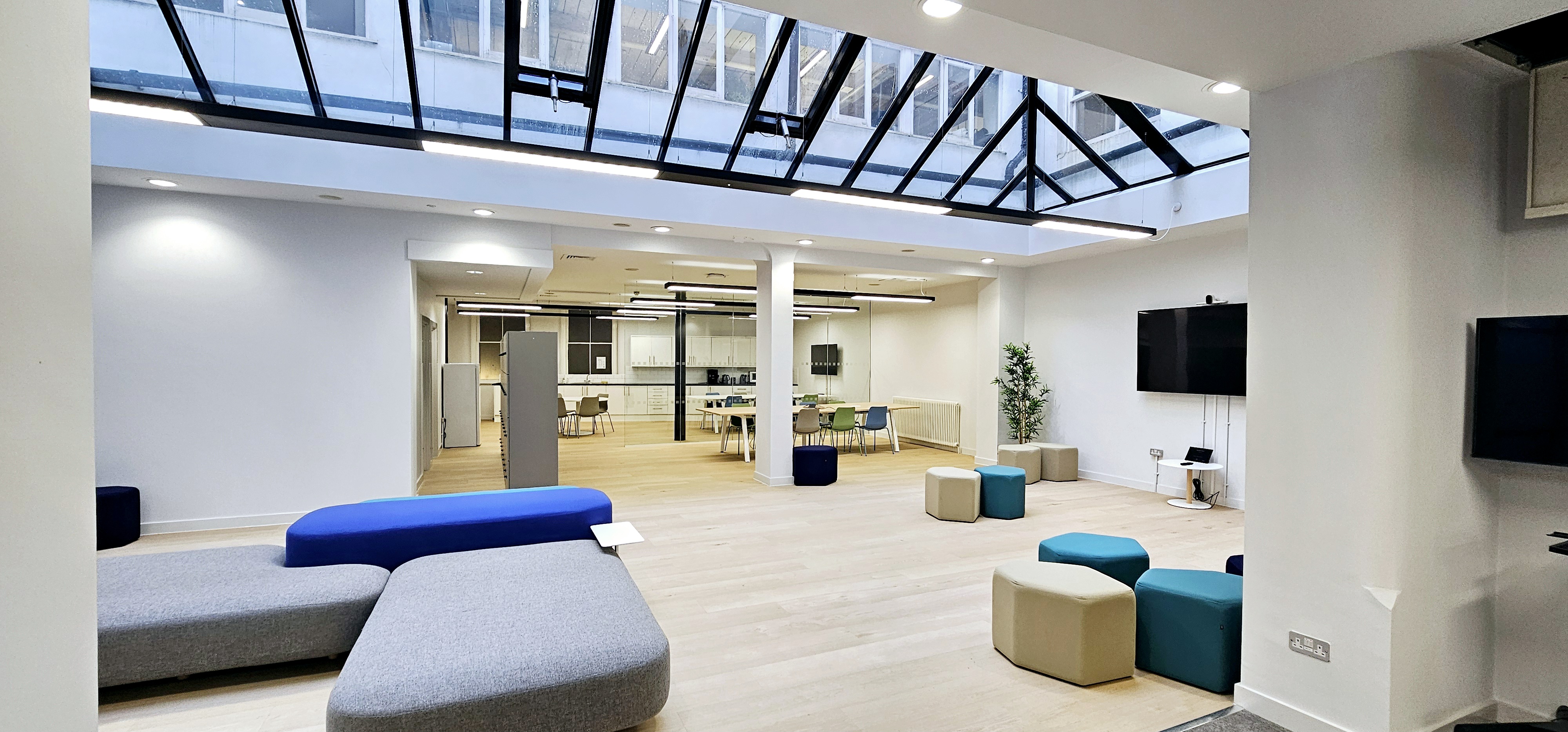 Modern event space in ZEBOX UK with natural light, ideal for meetings and gatherings. - Banner