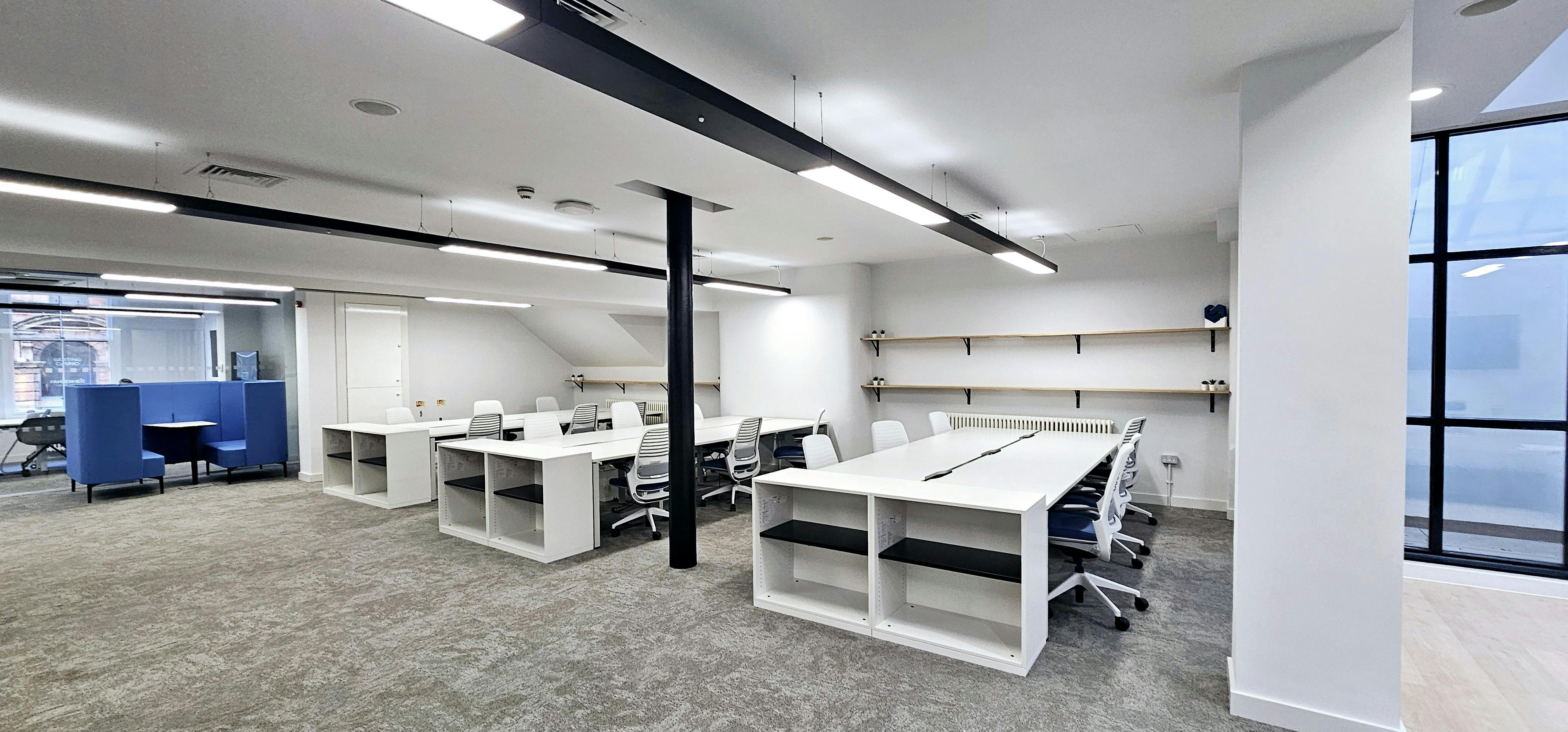 Flexible desk in modern meeting space at ZEBOX UK for collaboration and workshops.