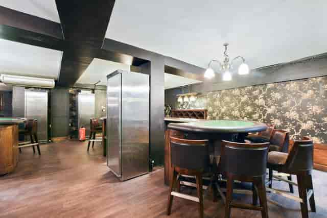 Stylish Camden Basement Lounge with dark wood accents for intimate events and meetings.