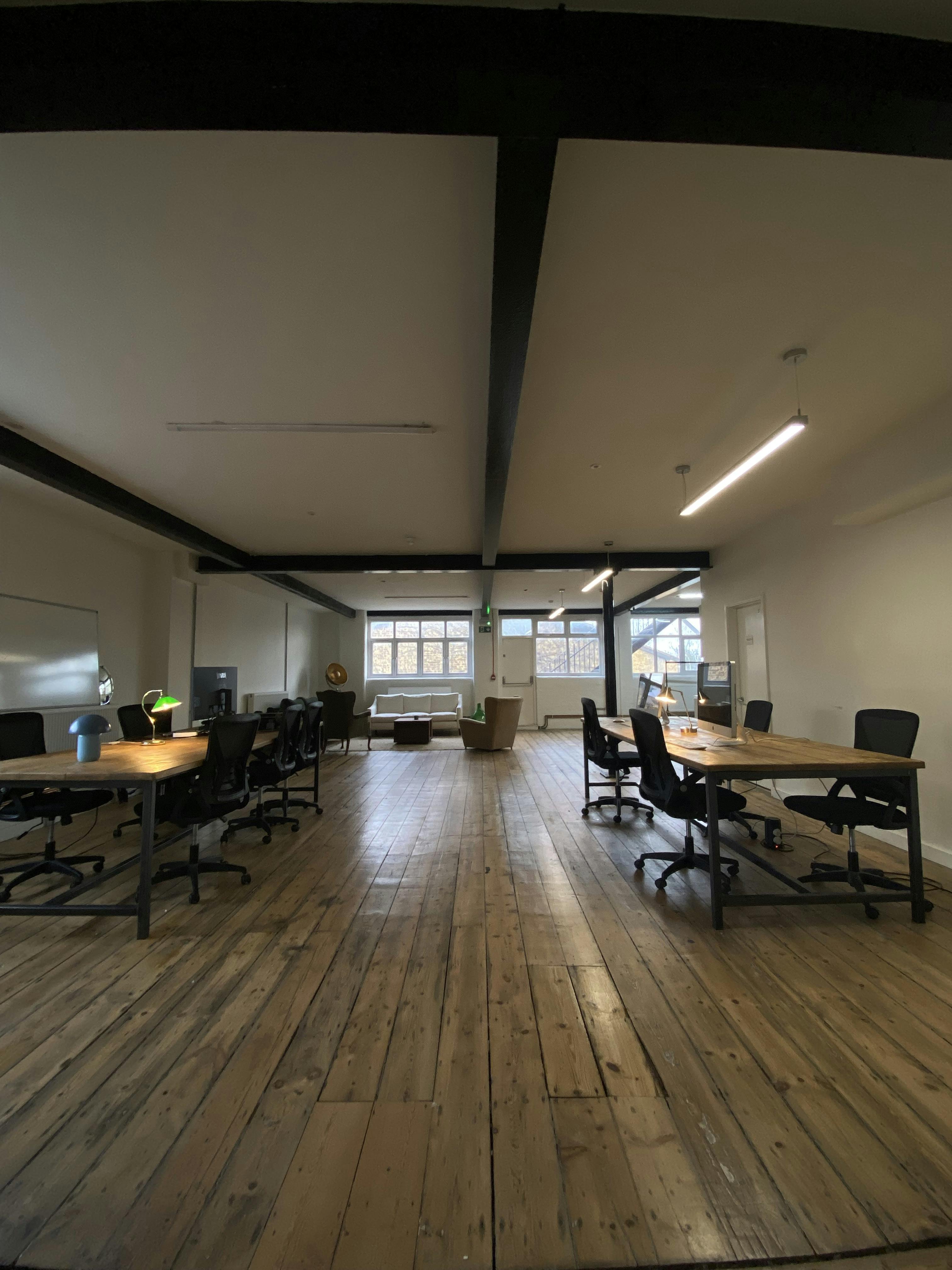 Spacious meeting room in Open X Space, ideal for collaboration and brainstorming sessions.