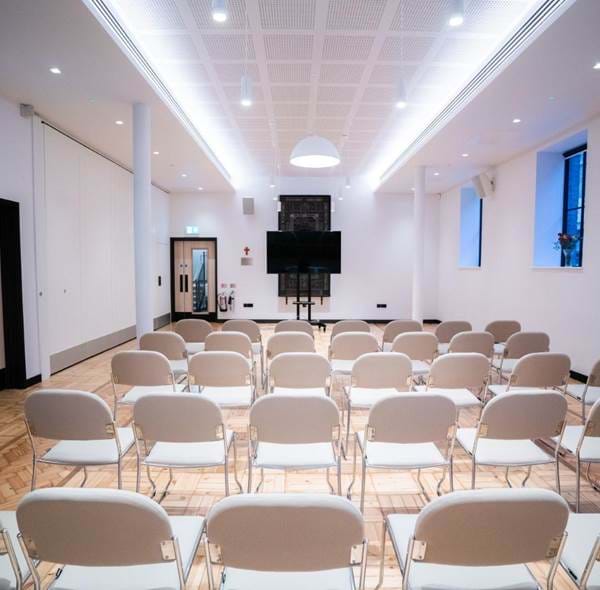 Wesleyan meeting space with modern design, ideal for presentations and workshops. - Banner
