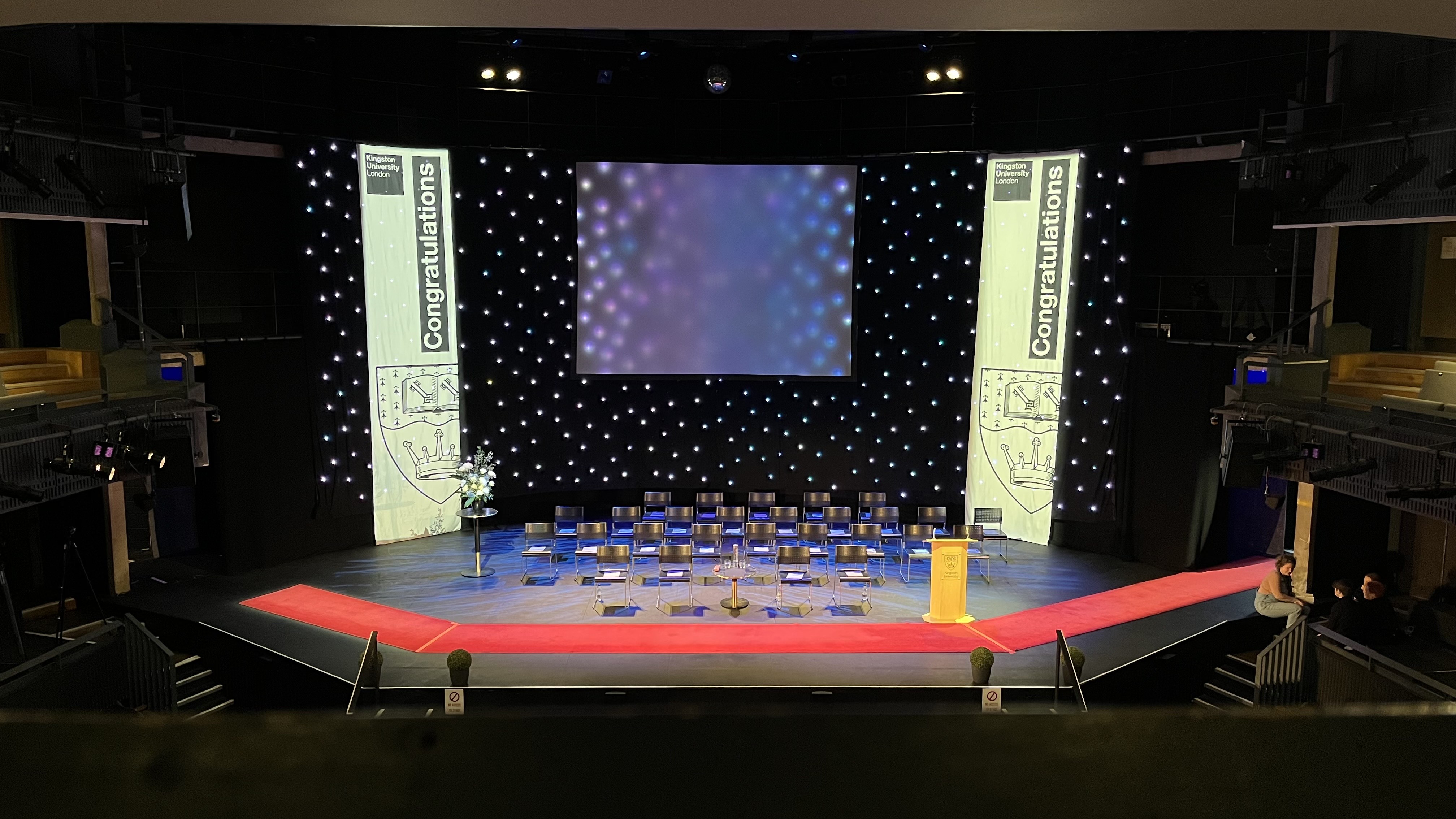 Main Auditorium at Rose Theatre ready for a professional conference with elegant stage setup. - Banner