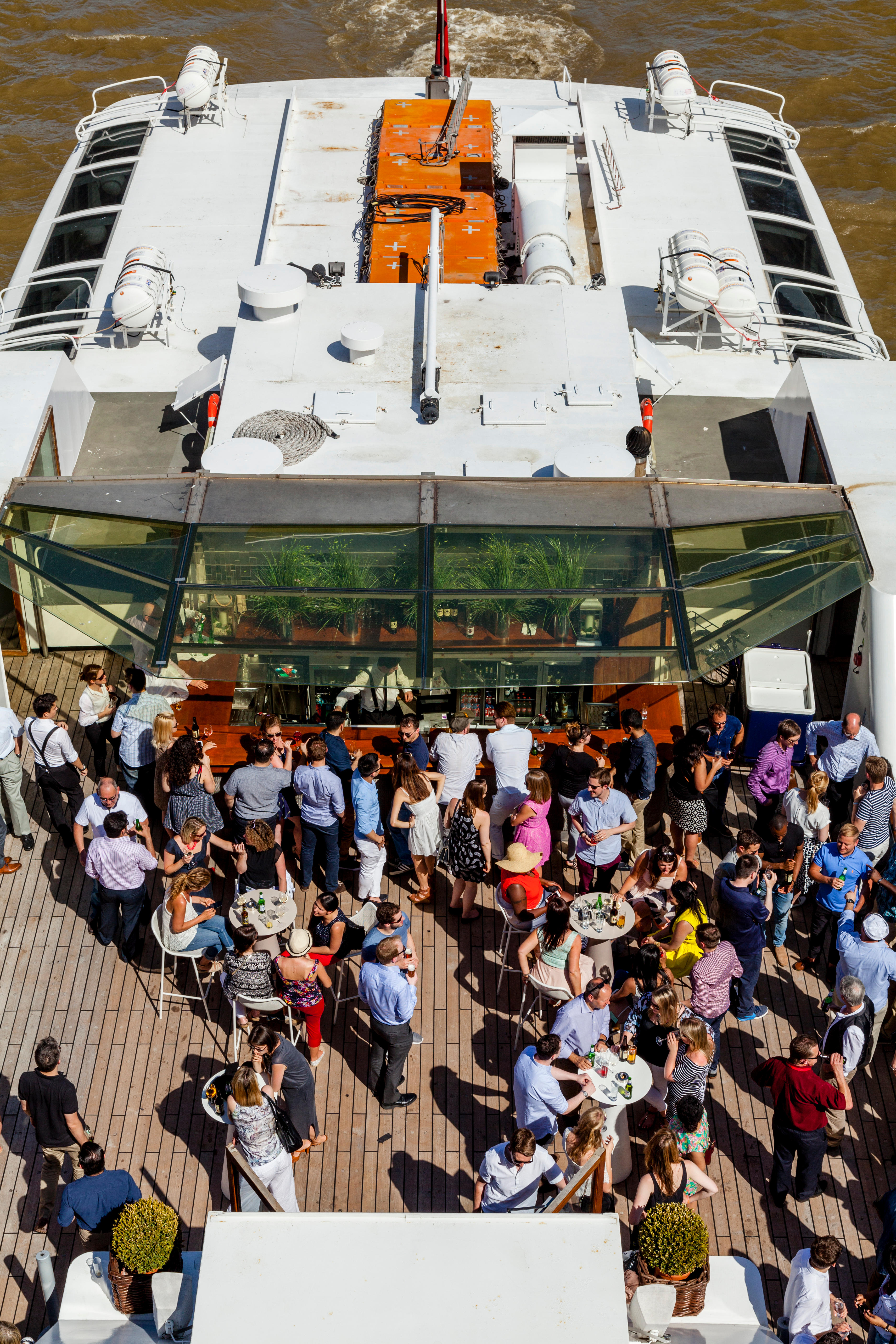 Silver Sturgeon rooftop event with greenery, ideal for networking and socializing. - Banner