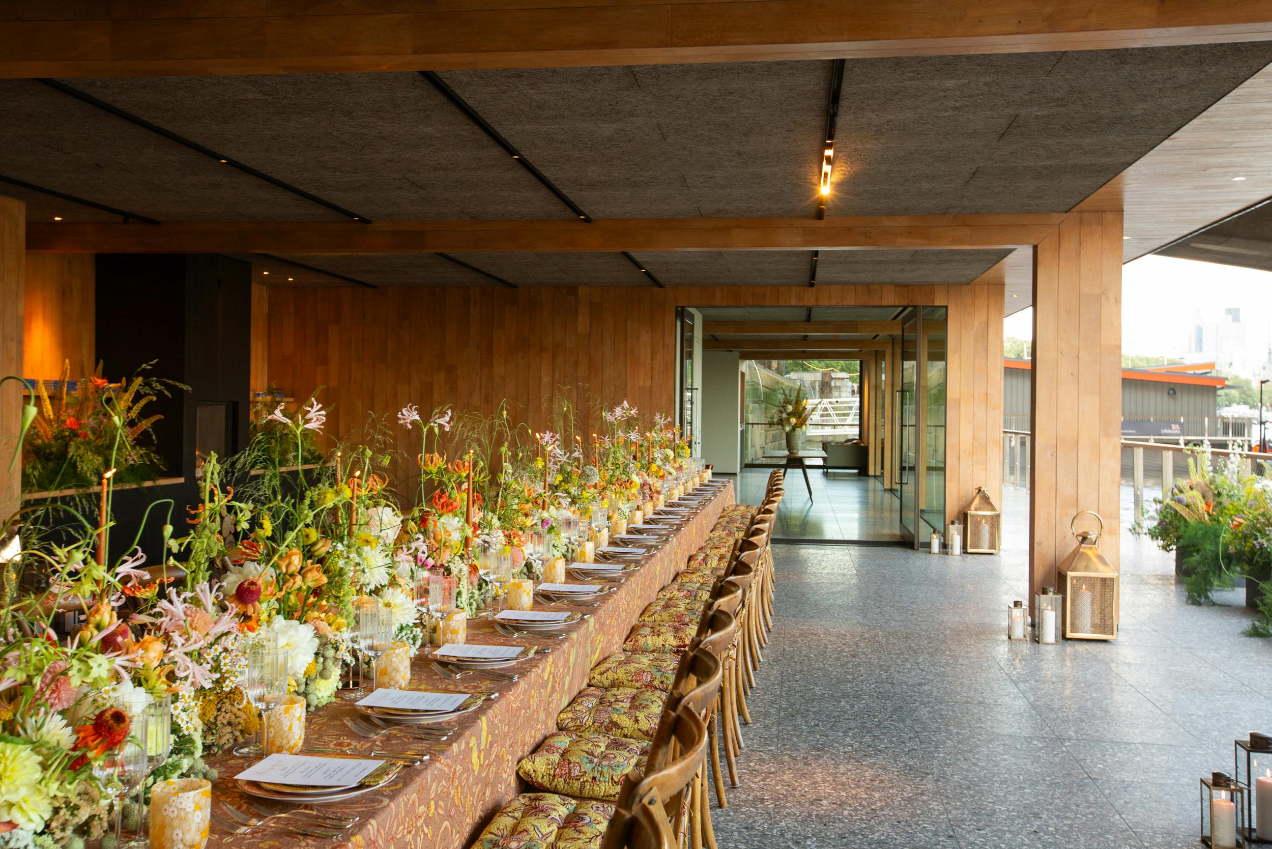 Woods Quay event space with floral centerpieces for corporate gatherings and celebrations.