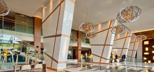 Modern lobby at EPIC SANA Hotel Lisboa, ideal for conferences and social events.