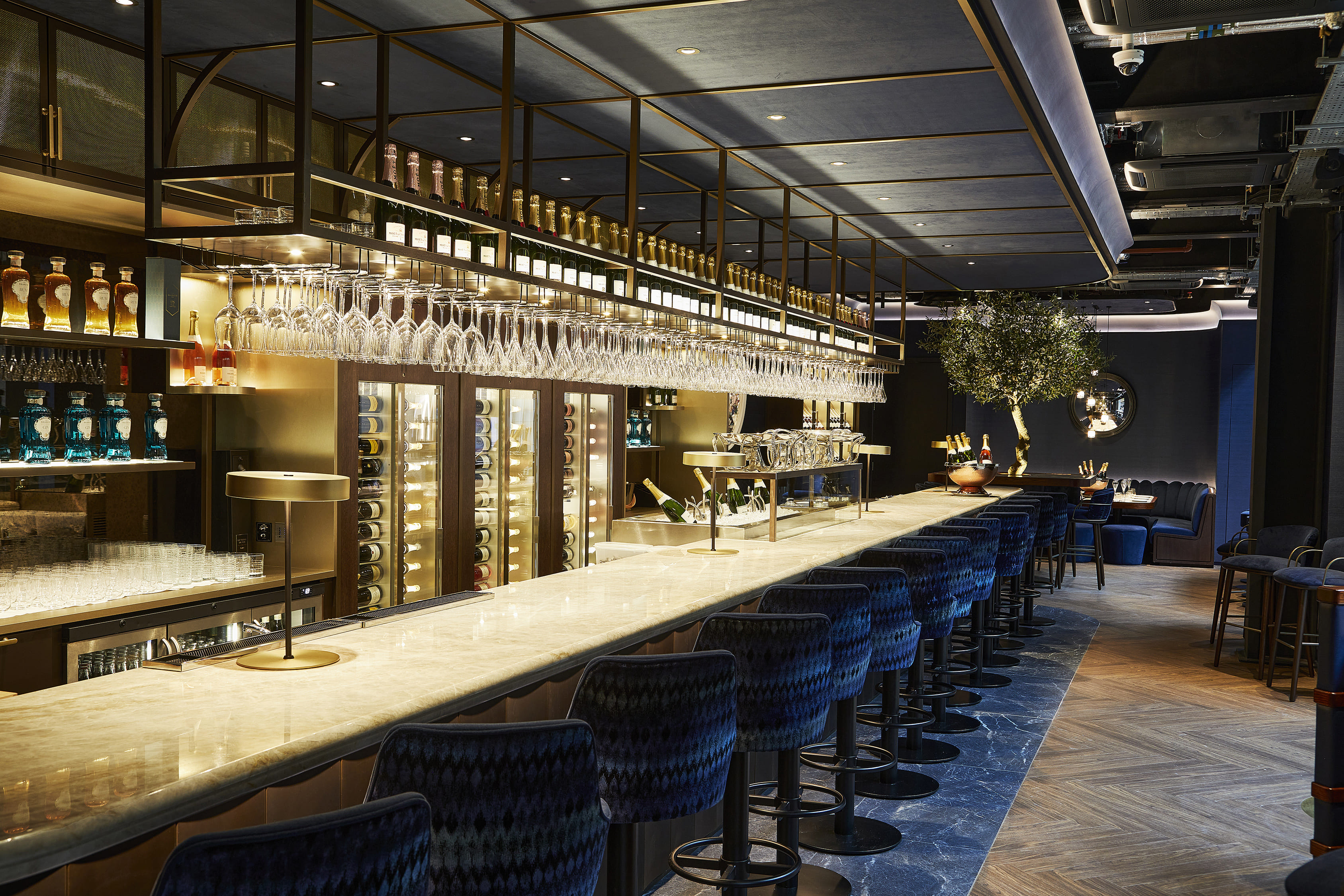 Searcys Champagne Bar at Battersea Power Station, modern marble bar for cocktail receptions. - Banner