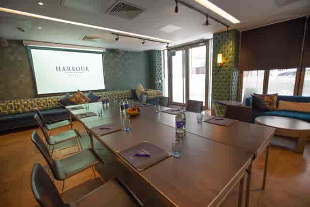 Long Bar Late meeting room with stylish seating, perfect for corporate workshops.