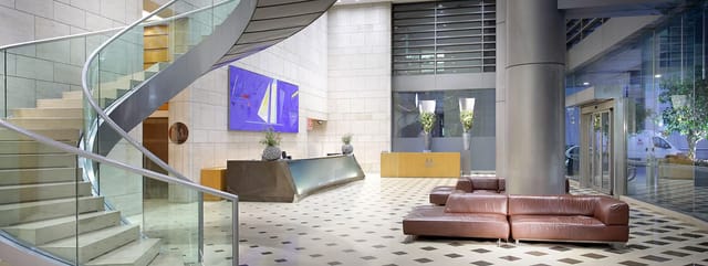 Modern lobby at Eurostars Grand Marina, ideal for corporate events and conferences.