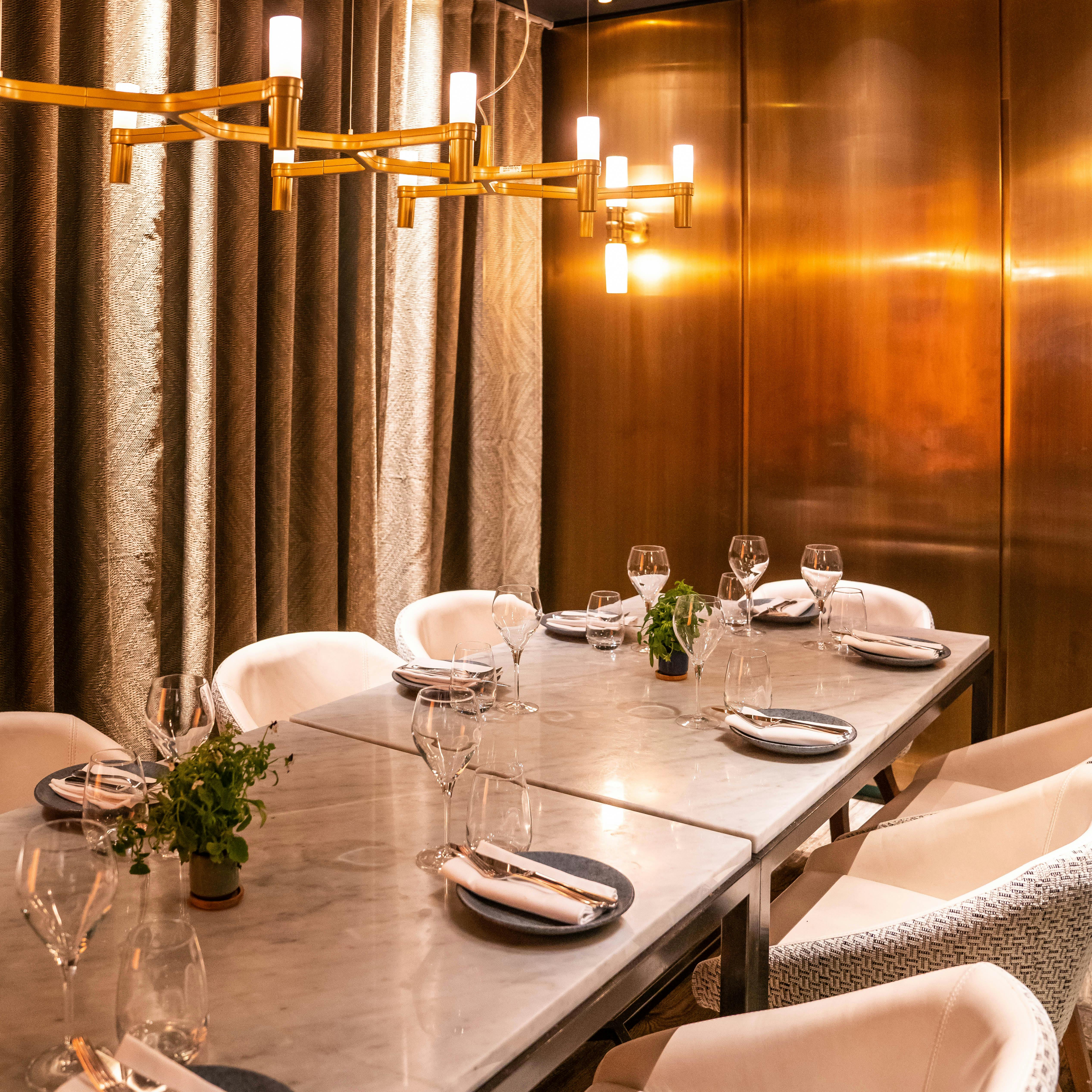 Private dining room in Farzi London with elegant table setup for intimate events.