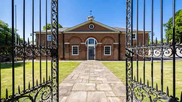 Foots Cray Mansion entrance with ornate gates, perfect for outdoor events and gatherings.