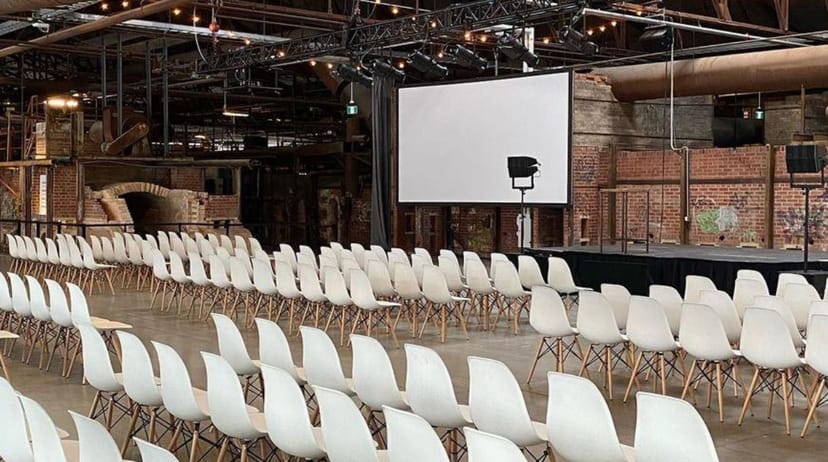 CRH Gallery event space with modern chairs, ideal for meetings and conferences.